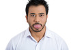 © pathdoc - Funny, unhappy young man sticking out his tongue