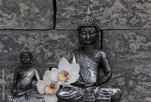 Naklejka - mata magnetyczna na lodówkę Zwei Buddhafiguren mit Orchidee