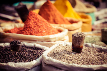 Poster - Indian colored spices at local market.