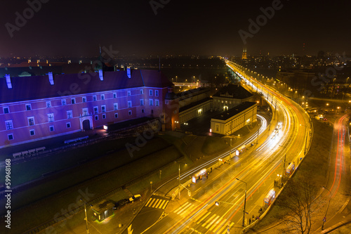 Board z aluminiowym obramowaniem Warszawa stare miasto w nocy