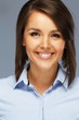 © Nejron Photo - Beautiful young brunette woman in blue shirt