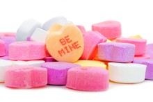 Pile Of Valentines Day Candies With BE MINE Message