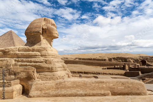 Naklejka ścienna Great Sphinx of Giza under a cloudy blue sky