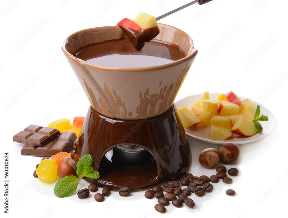 Chocolate fondue with fruits, isolated on white