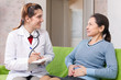 © JackF - Mature woman complaining  to doctor about stomachache