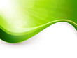Green background with light burst and wave pattern