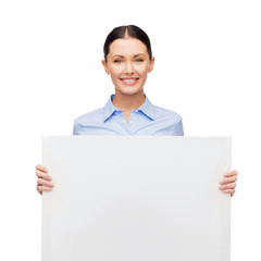 Canvas Print - smiling businesswoman with white blank board