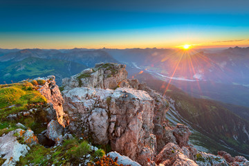 sunbeams while sunset in rocky tyrol mountains austria