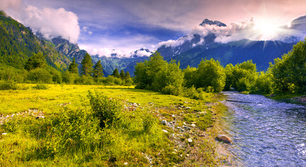 Fantastic landscape with a blue river in the mountains