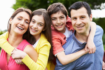 Portrait Of Hispanic Family In Countryside