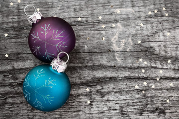 christmas decoration ball on textured grungy wooden surface