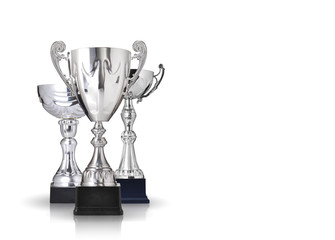 three different kind of silver trophies. Isolated on white backg