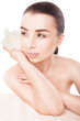 © julenochek - Young beautiful woman relaxing with flower at spa