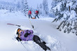 © CandyBox Images - Injured skier after accident waiting for rescue