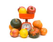 fruits, vegetables and kitchen scale on white background