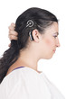 young deaf or hearing impaired woman with cochlear implant