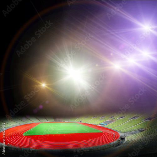 Fotografía Estadio de fútbol con las luces brillantes