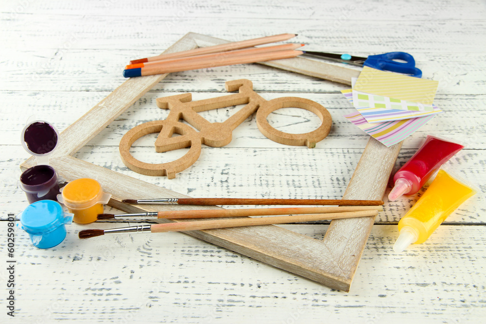 Decorative bicycle with needlework composition