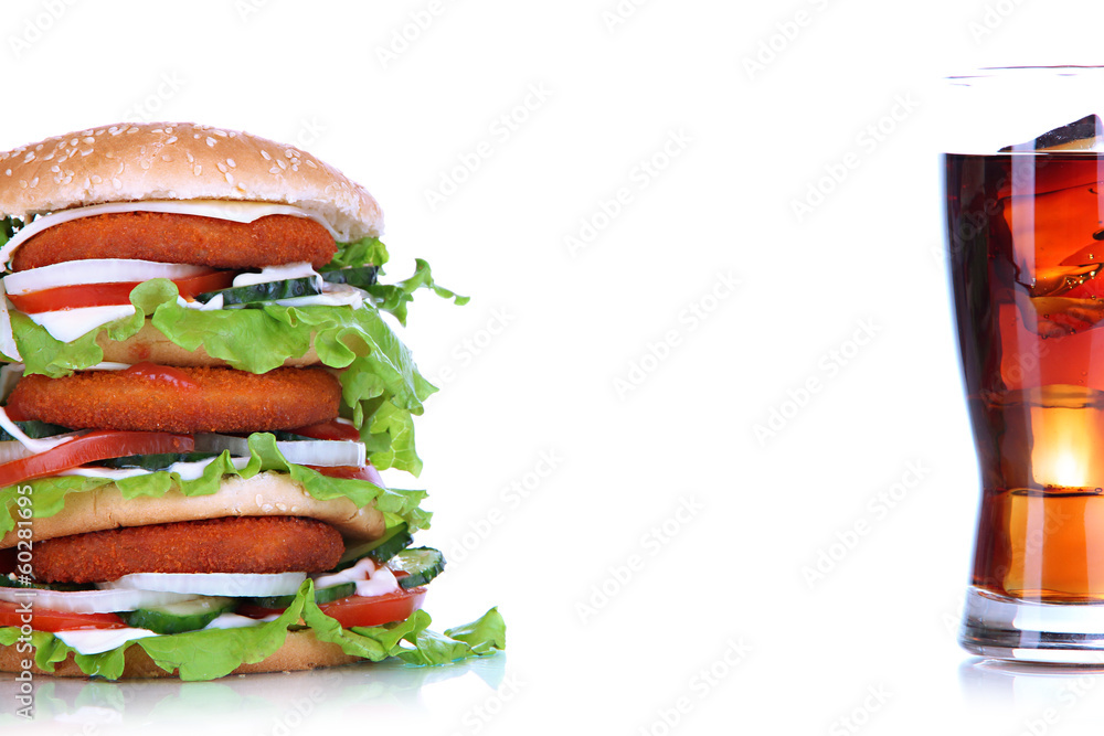 Huge burger and glass of cold drink, isolated on white
