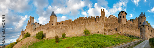 Fotoboard na płycie Panoramiczny widok średniowiecznych murów miasta Carcassonne w późnych godzinach popołudniowych
