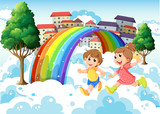 Fototapeta Las - Kids playing near the rainbow