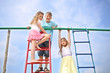 © Pavel Losevsky - Three children at the top of playground equipment