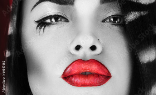 Fototapeta dla dzieci Horizontal photo of black and white female with red lips