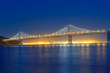 Fototapeta Nowy Jork - San Francisco Bay Bridge at sunset from Pier 7 California