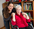 female senior in wheelchair with her daughter