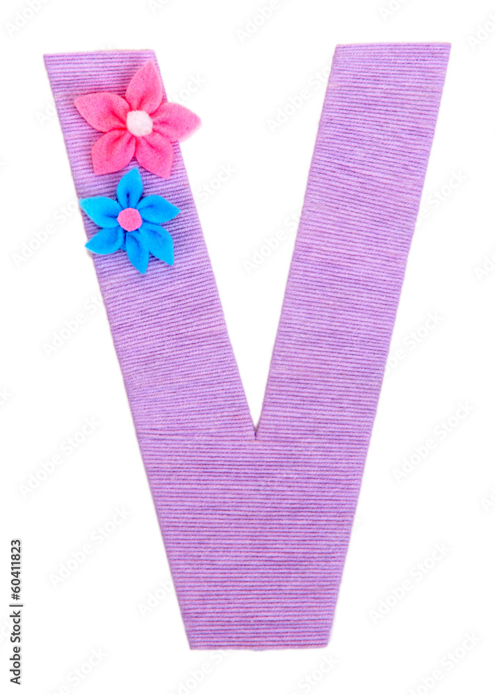 Letter V created with brightly colored knitting yard isolated