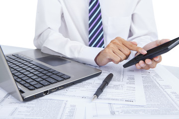 Businessman checking financial data