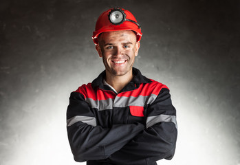 Smiling coal miner