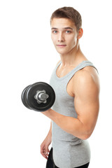 Wall Mural - young man bodybuilder exercising with dumbbells