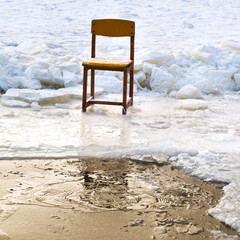 Sticker - icebound chair on edge of ice-hole in frozen lake