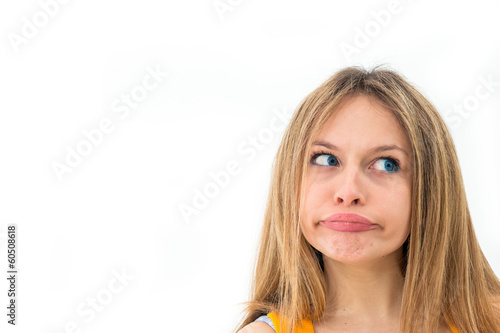Cuadros en Lienzo Young woman making a funny grimace