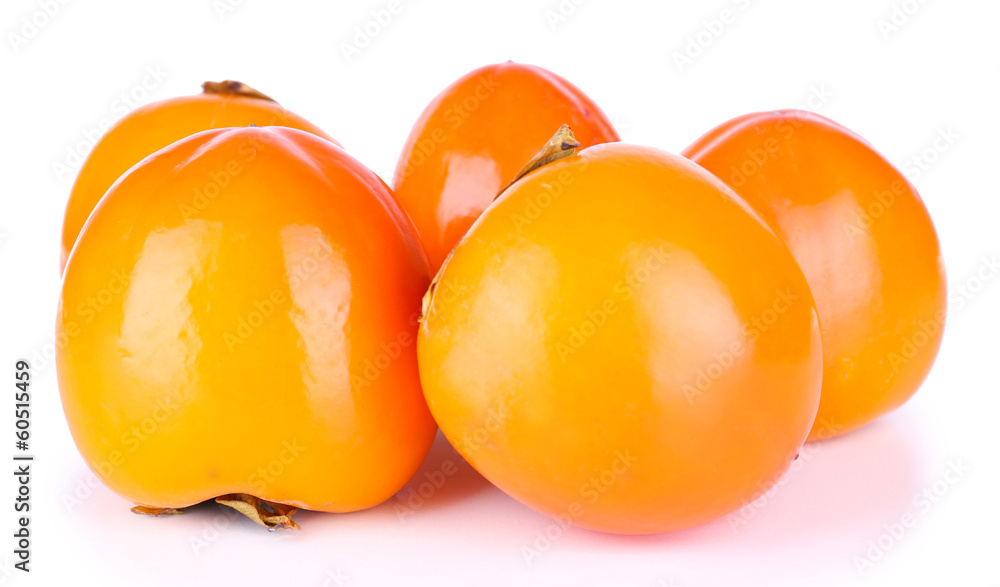 Ripe persimmons isolated on white