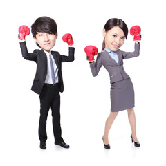 Canvas Print - Business man and woman win pose with boxing gloves