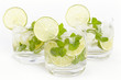 Three glasses with Mojito cocktail