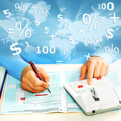 Aufkleber - Hands of business people with calculator.