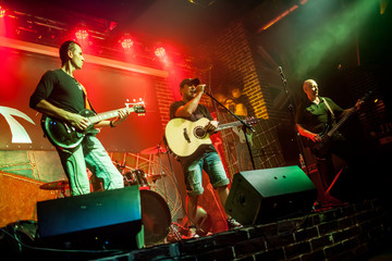 Poster - Band performs on stage