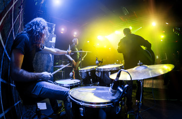 Poster - musicians play on stage