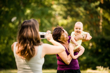 Wall Mural - Precious memories - grandmother with baby