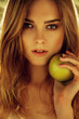 © ASjack - Picture of young beautiful woman with green apple