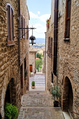 Fototapeta na wymiar Medieval stepped street in the Italian hill town of Assisi