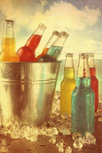 Cool Drinks In Ice Bucket At The Beach With Vintage Look