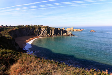 Wall Mural - coastal landscape with blue sea and beautiful cliffs