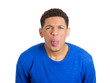 © pathdoc - Funny, angry, young, childish rude bully man sticking his tongue