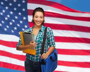 Poster - smiling student with folders, tablet pc and bag