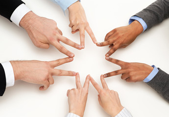 Poster - group of businesspeople showing v-sign