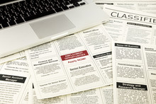 Newspaper With Advertisements And Classifieds Ads
